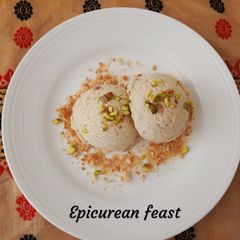 No machine Fig and Cinnamon Ice-cream garnished with cookies A picture of No machine Fig and Cinnamon Ice-cream garnished with cookies.
