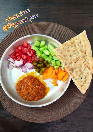 عکسی از دستور خوراک گوجه بادمجان
