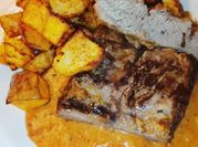 Una foto de tapa de asado