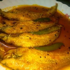A picture of Pabda fish curry or pabda macher jhol.
