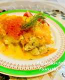 Hake in the oven under a cheese crust