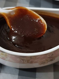 A picture of Imli chutney or tamarind chutney.