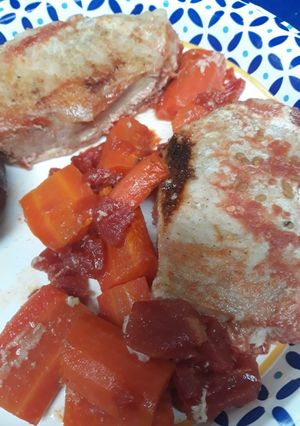 A picture of Tomatoes, Carrots, and White Peppered Porkloin.