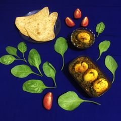 A picture of Egg Palak Curry.
