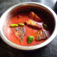 A picture of Rohu fish curry.