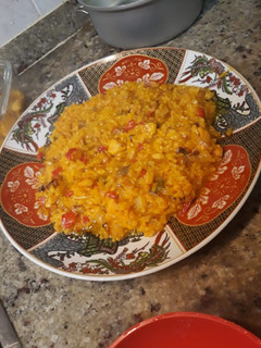 Una foto de Arroz meloso con pescado y marisoco