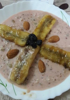 A picture of #name contest#caramelized banana in a pool of rabri#cookpadindiacommunity.