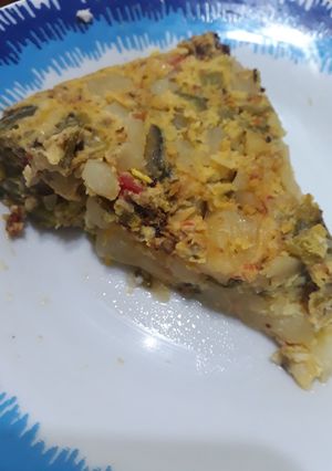 Una foto de Tortilla de papa y zapallito en olla essen