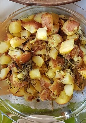 Una foto de Papas al romero