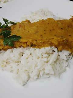 Una foto de Salsa de zapallo con arroz blanco