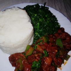 Ugali recipe served with beef and sukuma wiki A picture of Ugali recipe served with beef and sukuma wiki.