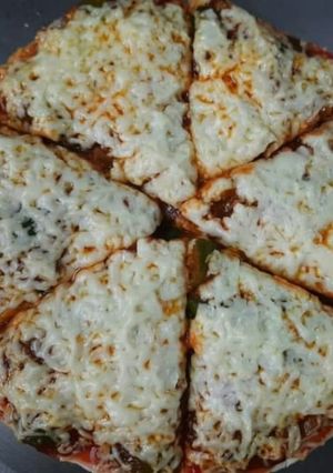 A picture of Whole wheat pizza recipe | wheat pizza base.
