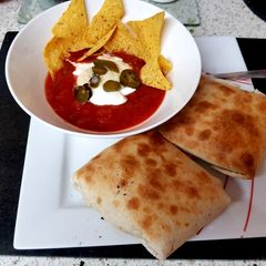 A picture of My Mexican chimmichangers. With Mexican white Sauce. 😘.