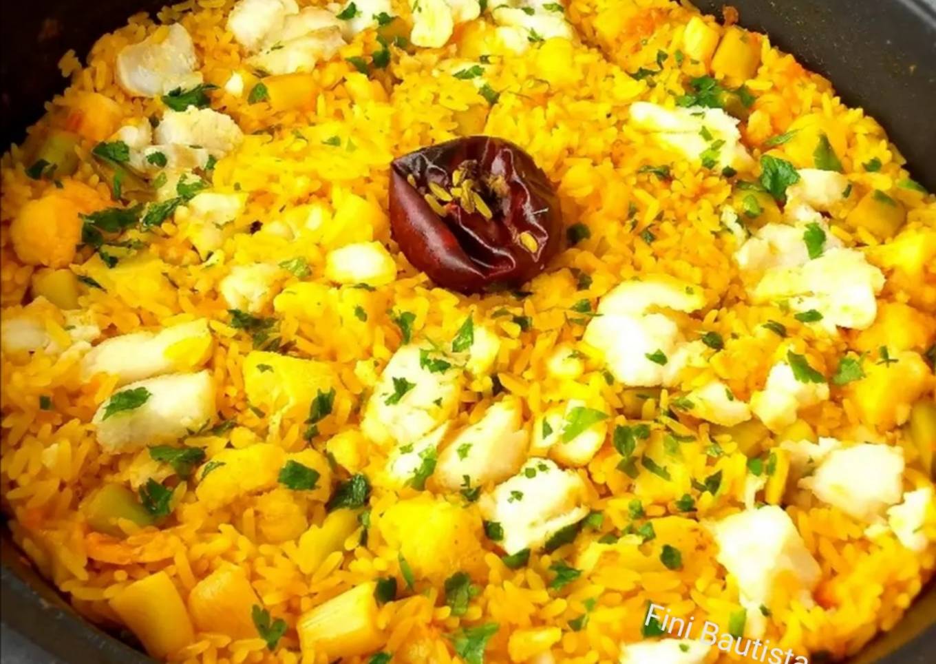 Arroz con bacalao ajos tiernos y coliflor