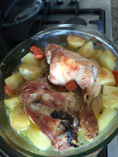 Una foto de Pollo al horno con papas