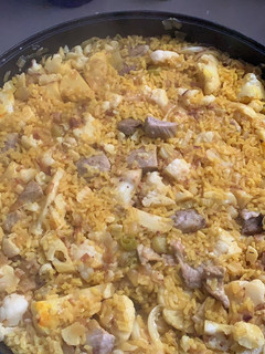 Una foto de Arroz con secreto ibérico y coliflor