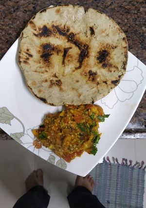 A picture of Baingan bhartha and bajara roti.
