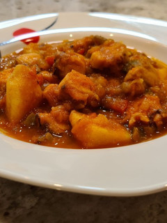 Una foto de Pulpo guisado con patatas y calabaza