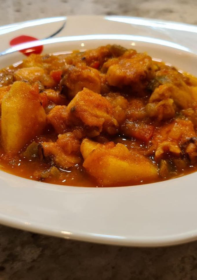 Una foto de Pulpo guisado con patatas y calabaza