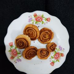 A picture of Pine wheel Samosa / Potato Bhakarvadi.