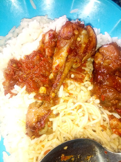 A picture of Rice,spaghetti and stew.