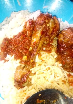 A picture of Rice,spaghetti and stew.