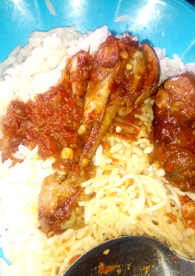 A picture of Rice,spaghetti and stew.