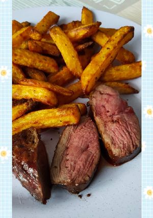 Une photo de Magret de canard au four