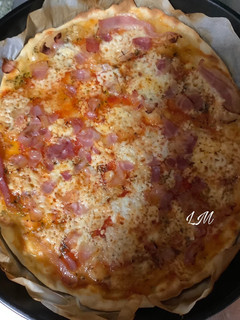 Foto principal de Pizza de queso de cabra, bacon y miel