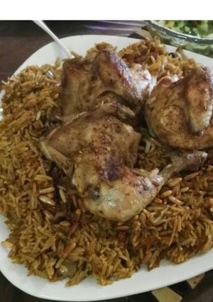 صورة لوصفة الأرز البخاري بالجزر المبروش والدجاج المحمر