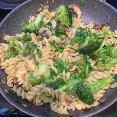Fusilli with broccoli, arugula and mushrooms A picture of Fusilli with broccoli, arugula and mushrooms.