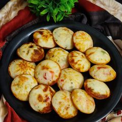 A picture of Veg Rava Paniyaram.