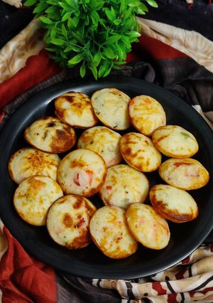 A picture of Veg Rava Paniyaram.