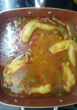 Una foto de Arroz con pollo y patatas