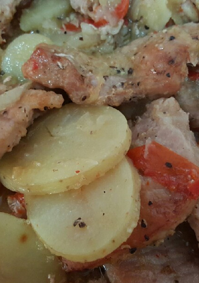 Una foto de Lomo con papas horneado