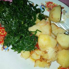 A picture of Potatoes and sukuma.