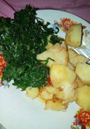 A picture of Potatoes and sukuma.