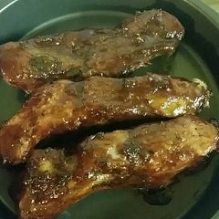 A picture of Easy BBQ Ribs in the oven.