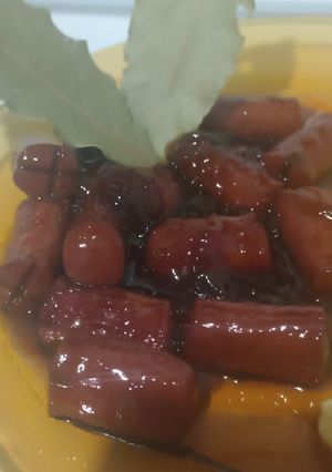 Una foto de Salchicha a la Coca-Cola con cebolla