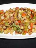 Papas salteadas con romero y pimientos