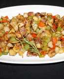 Papas salteadas con romero y pimientos