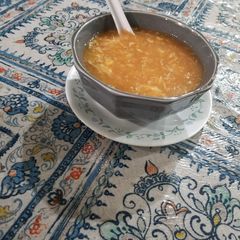 A picture of Chicken tomato soup.