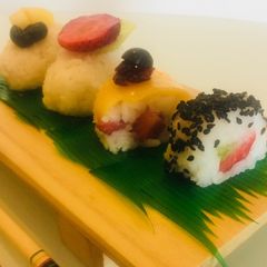 A picture of Fresh fruit sushi platter.
