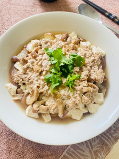A picture of Steamed Tofu with minced pork and eggplant.