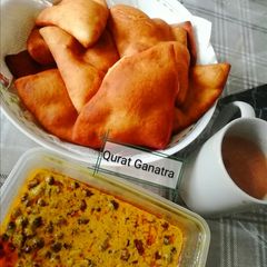 A picture of Mandazi and Baraazi (Kenyan dish).