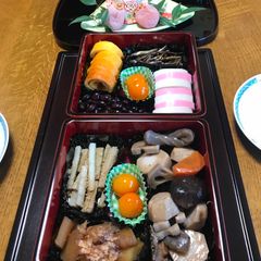 A picture of Osechi ryori, Japanese new year foods, sweet Kumquat.