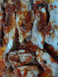 Una foto de Pechito de cerdo con dulce de tomate