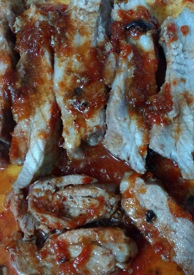 Una foto de Pechito de cerdo con dulce de tomate
