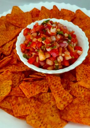 A picture of Salsa with Nachos.