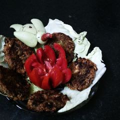 A picture of Spinach bottle gourd fritter.
